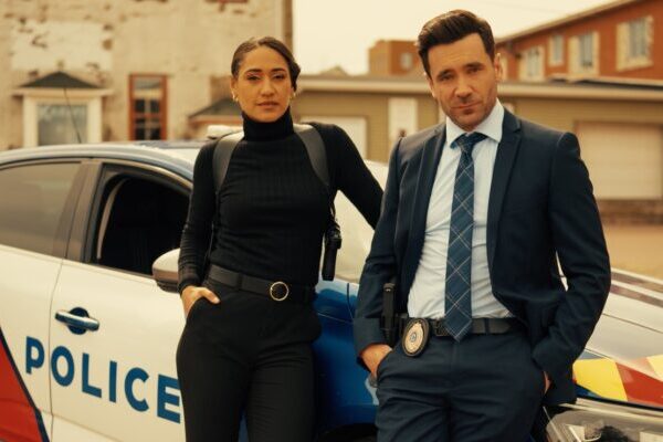 Josephine Jobert and Allan Hawco as Arch and Fitz on CBC's Saint-Pierre