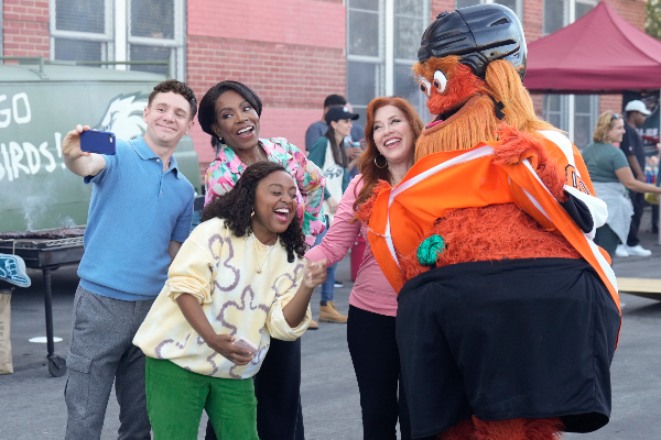 The cast of Abbott Elementary with Philadelphia Flyers mascot, Gritty